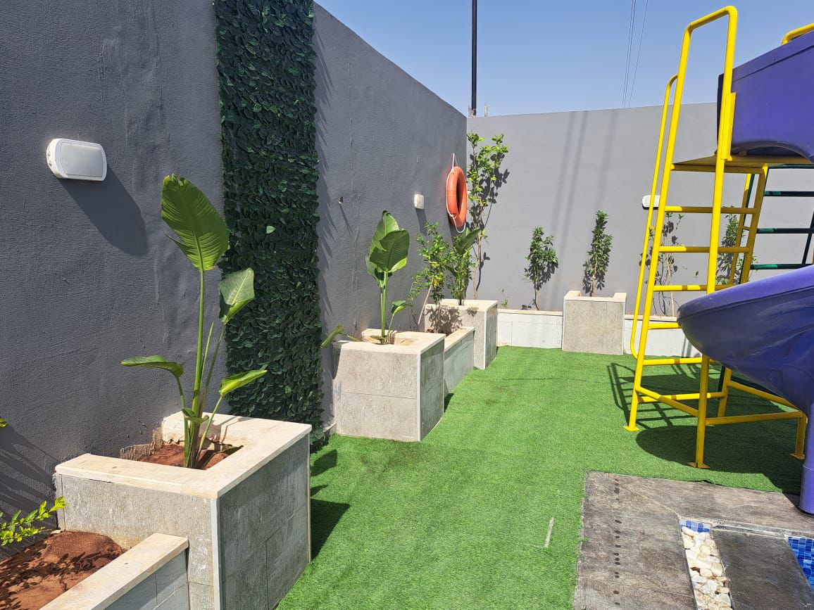 زاوية الحديقة وزلاقات الأطفال