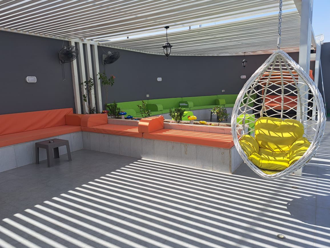 الاسترخاء المظلل مع الكرسي المعلق